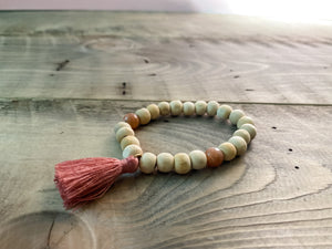 Wood Bead, Pink Moonstone, and Mauve Tassel Bracelet